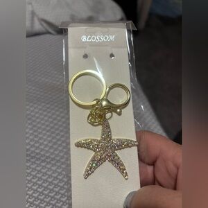 Gold Starfish Keychain with Pink Iridescent Stones
